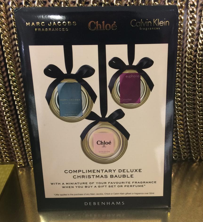 Coty Deluxe Christmas Bauble 1. Deluxe Christmas Bauble containing miniature fragrance 2.