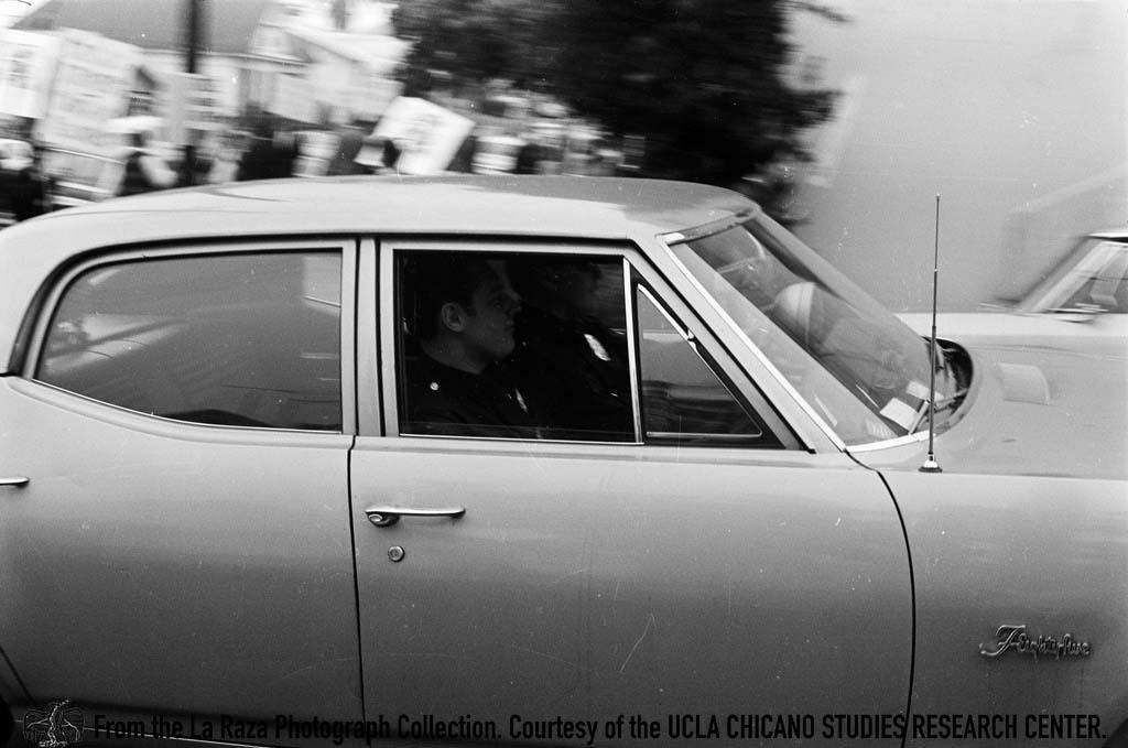 Men in a car during the Roosevelt High School walkouts La Raza