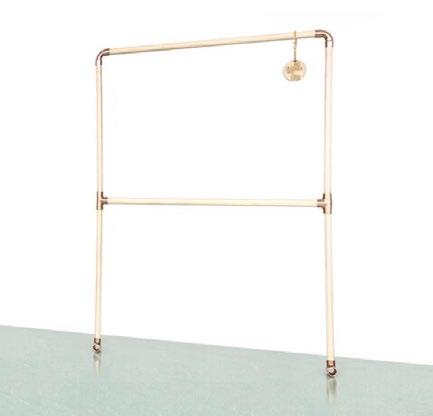 Our wooden & copperjelry rack makes an easy and beautiful display on the