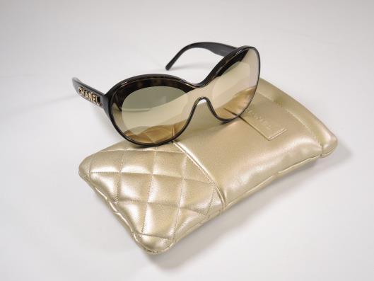 CHANEL 2019 Tortoise and Gold Shield Sunglasses Retails for $650, sold in one day for $299.