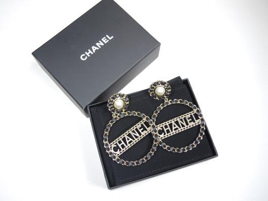 CHANEL 2018 Extra Large Pearl, Gold Chain and Black Leather Hoops Retailed for $1500, sold in one day for $799.