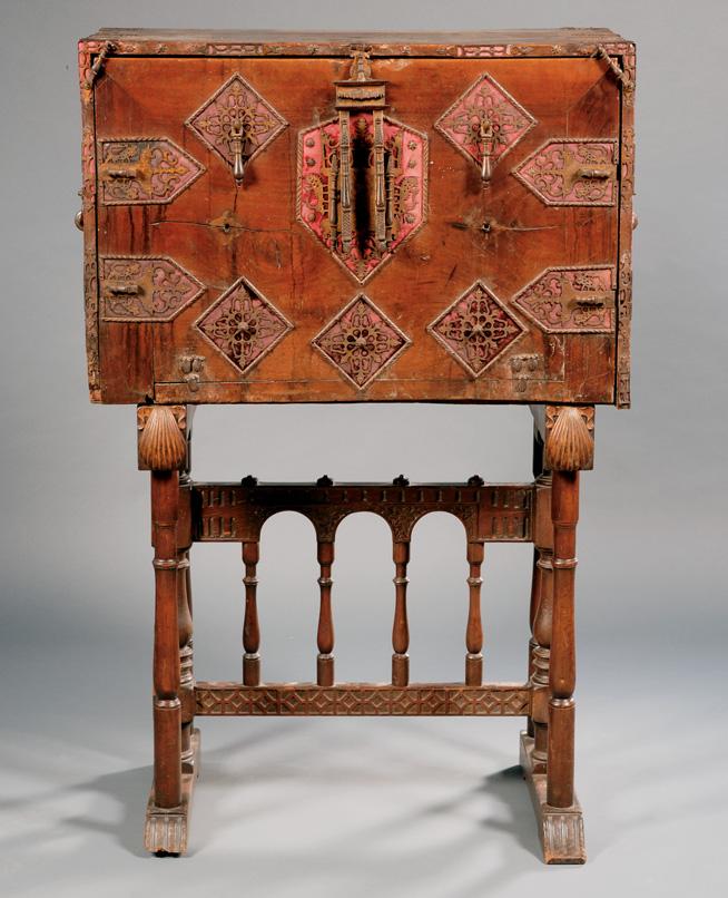 654A 651. Regency Ebony String-inlaid Mahogany and Caned Library Chair, early 19th century, with loose cushions to backrest and seat; reeded frame and legs, on casters, seat ht. 15, wd. 20, dp. 24 in.