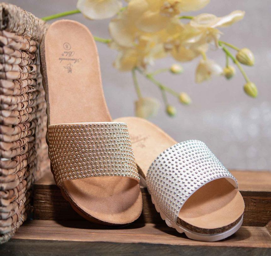 BEADED METALLIC UPPERS WILL SPARKLE IN THE SUMMER SUN. FEATURES A LOW WEDGE CORK HEEL FOR ALL DAY COMFORT.