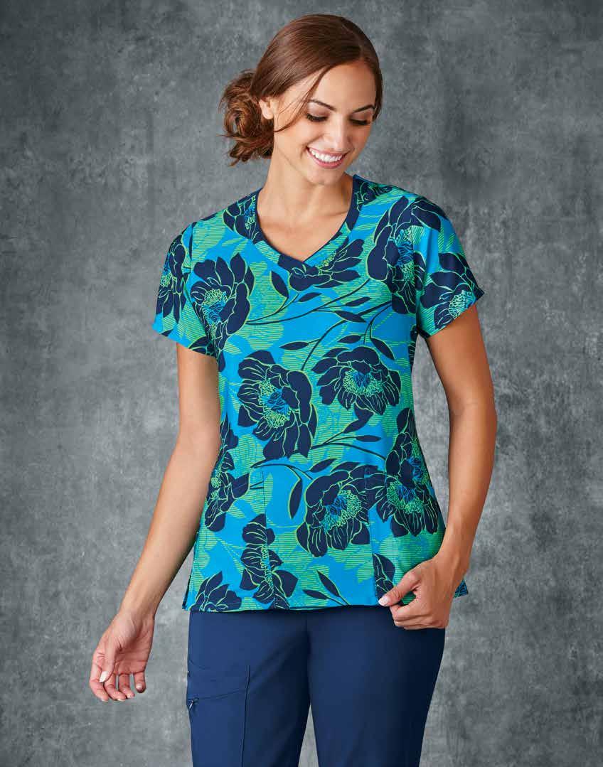 DEWY DAYDREAM PRINTED V-NECK TOP Unique v-neck design with contrast piping adds individual style Two deep angled patch pockets with contrast mobile device pocket Side-seam hem venting offers
