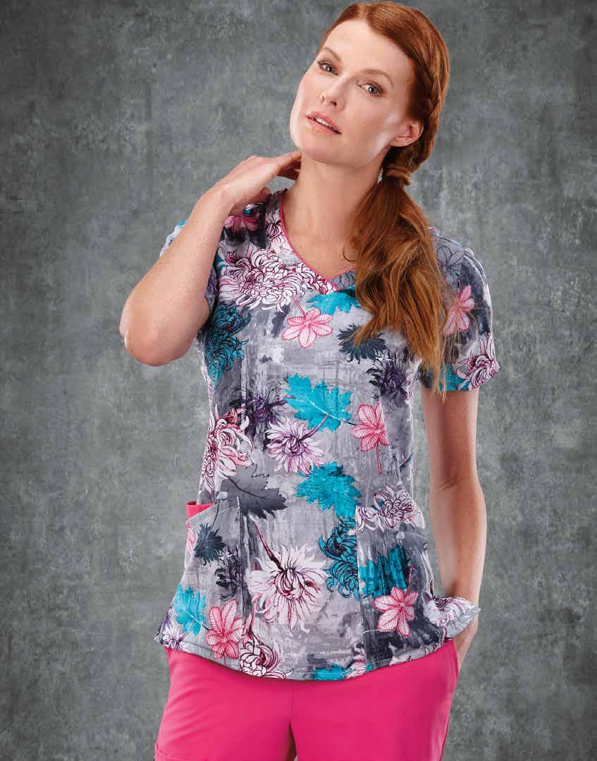PRINTED V-NECK TOP Unique v-neck design with contrast piping adds individual style Two deep patch pockets plus mobile device pocket add convenience Side-seam hem venting offers effortless, all-day