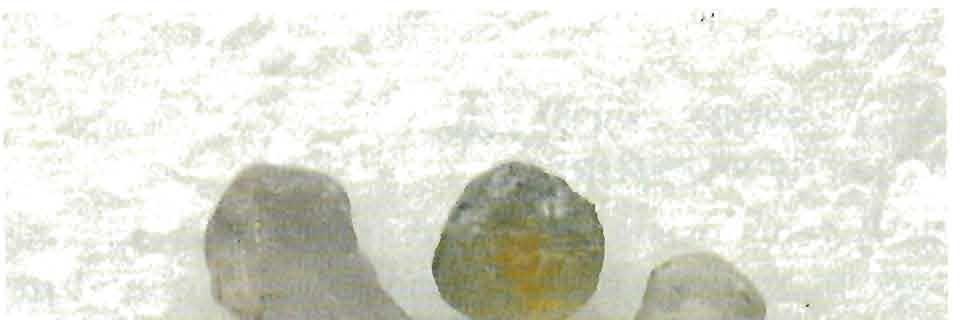 , 1983). Lastly, color may be induced by diffusing iron (or nickel) into the surface of a sapphire (Nassau, 1980). On the basis of the information Figure 3.