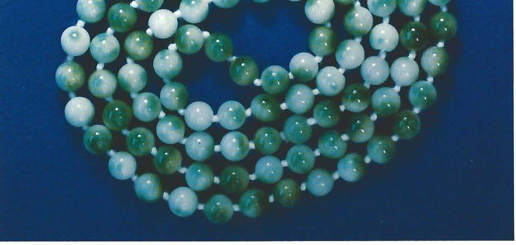 Clayton Welch Imitation JADE The strand of variegated green-andwhite beads shown in figure 6 had Figure 7.