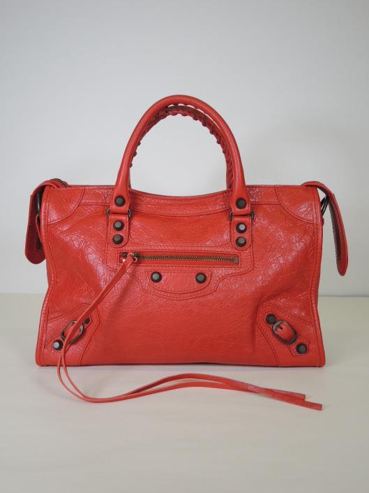 BALENCIAGA Cardinal Red Leather Small Classic City Bag Retails for $2050, sold in one day for $1000.