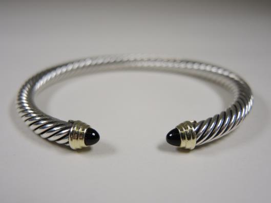 DAVID YURMAN Sterling, 14K, and Onyx Medium 5mm Classic Cable Cuff Retailed for $550, sold in one day for $299.