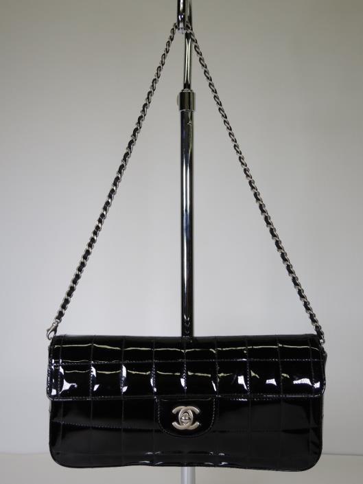 CHANEL Black Quilted Patent Leather East/West Flap Bag Sold in one day for $1,000.