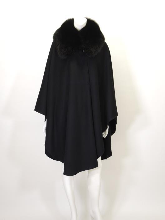 BURBERRY LONDON Black Cashmere/Wool Cape with Fox Fur Collar, Size M Sold in one day for $399. 02/10/18 Opulent elegance moves through this gorgeous cape by Burberry.