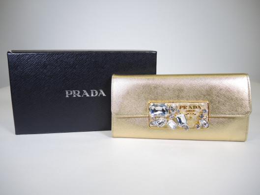 PRADA Gold and Crystal Wallet Retailed for $550, sold in one day for $279. 02/03/18 If this fabulous wallet were mine, I would never hide it inside a purse, but instead use it as an evening clutch.