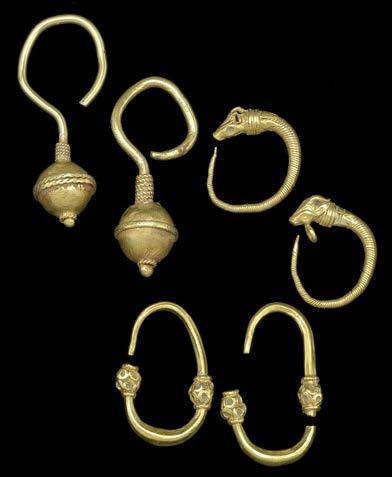 33 THREE PAIRS OF GOLD EARRINGS, CIRCA 9TH-12TH CENTURIES AD, the first a pair of goat s head hoop earrings, the tapered hoop of twisted wire to goat s head terminal, the second