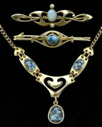 119 TWO MURRLE BENNETT & CO BROOCHES AND A SIMILAR NECKLACE, the first brooch centred with a cabochon opal with pearl highlights, within whiplash design, 15ct gold with stamped maker s mark, the