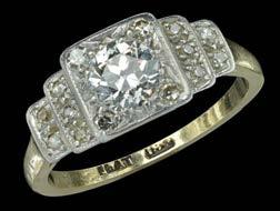 baguette-cut diamonds, mounted in white precious metal, sizing beads to shank, aquamarine approximately 14.6 carats, ring size K.