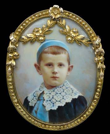 224 A LATE 19TH / EARLY 20TH CENTURY CONTINENTAL PORTRAIT BROOCH, the oval enamel panel finely painted to depict the head and shoulders of a young boy, dressed in a dark blue jacket with a broad