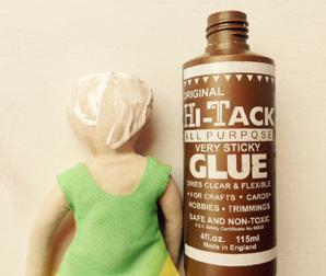I use a tacky craft PVA glue to glue the back of the doll s