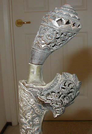 Silver sheaths and handle.