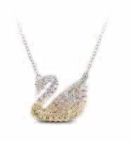 It is delicately embellished with subtly shaded graduating crystals, set in Swarovski s exclusive crystal Pointiage technique. Comes on a rhodium-plated chain. Two-year international warranty.
