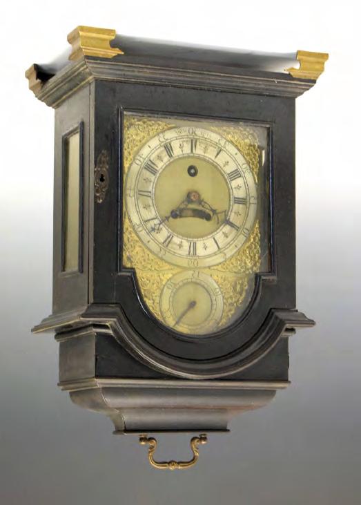 Lot 13 Staffordshire Interest - George II ebonised single-fusee bracket or table clock, John Smallwood, Litchfield (Lichfield), circa 1740, the 17cm break-arched brass dial having a silvered chapter