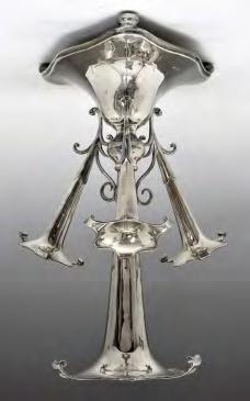 3oz approx 800-1200 (+24% BP*) Lot 112 George V silver four trumpet epergne, the central trumpet surrounded by three smaller trumpets, each within a scroll socket, the whole standing on a triangular