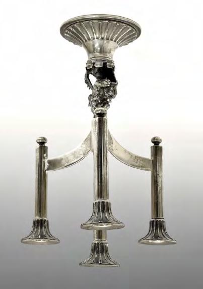 5oz approx 100-125 (+24% BP*) Lot 116 Lot 116 Elizabeth II silver Queens Silver Jubilee Candelabrum, having four branches supported by a cast lion rampant and standing on a circular foot, No.