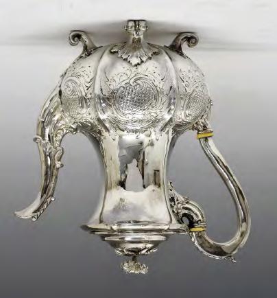Lot 137 Lot 137 Victorian silver baluster shaped coffee pot, having a scroll handle with acanthus capital, the hinged cover with foliate knop, lower body with embossed