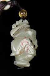 017 清白玉水盂带皮带座 WHITE JADE WATER POT WITH STAND The waterpot of irregular form carved in low-relief with a lotus leaf and