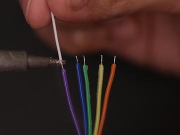 Connect Extension Wires to Jumper Cable Solder the extension wires to the jumper cable by