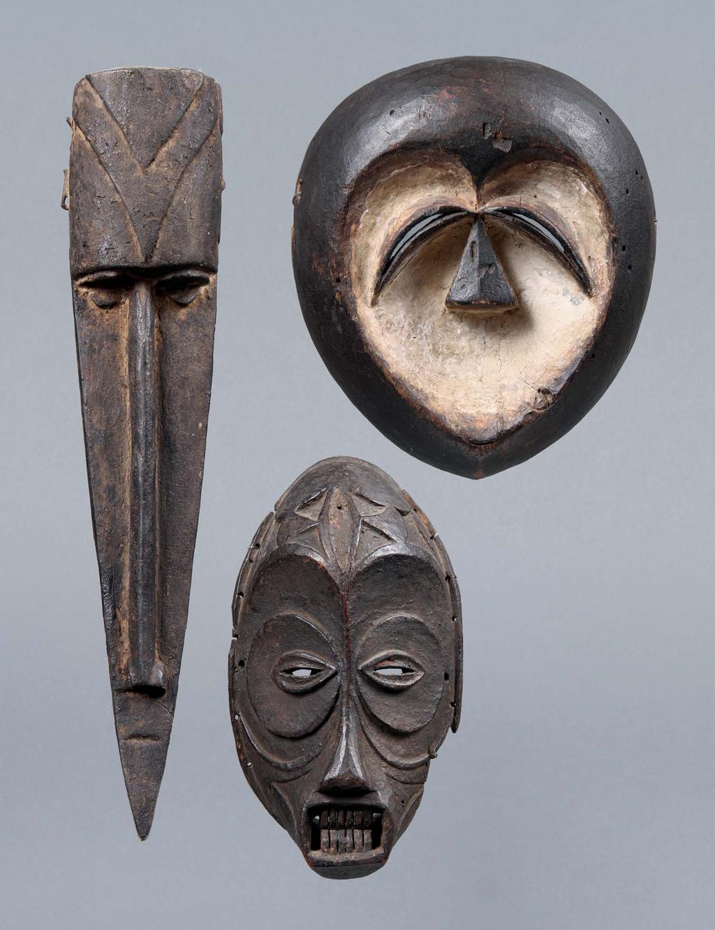 JAY T. LAST FIG. 8 (above): Mask. Kwele, Gabon. Wood, pigment. H: 27 cm. FIG. 9 (far left): Mask.