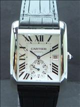 Lot: 059 6WI73 CARTIER, AN UNUSED GENT'S S/STEEL TANK MC AUTOMATIC WATCH 卡地亚全新男装钢坦克系列自动钢表 ( 附盒子和证书 ) 最新款式! Rectangular case. Metallic guilloche dial with black roman numerals and electric blue hands.