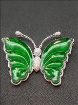 Estimate: $8,800 to $9,800 Lot: 104 A 18K WHITE GOLD NATURAL TYPE 'A' JADEITE DIAMOND BUTTERFLY BROOCH/PENDANT 白金钻石天然翡翠蝴蝶款胸针 / 坠子, 附本地南洋宝石证书 Butterfly designed double usage of brooch and pendant,