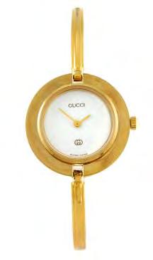 126 127 129 GUCCI - a lady s Interchangeable bracelet watch. Reference 11/12, serial 0537859. Signed quartz movement. White dial.