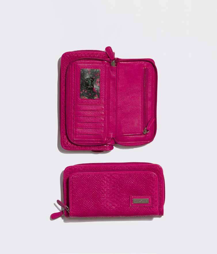 wallet ( fuchsia snake) WALLET (FUCHSIA SNAKE) - SKU 9123 Need lots of space? This is the wallet for you! Exterior is bright fuchsia snake faux leather kissed with glossy spots.