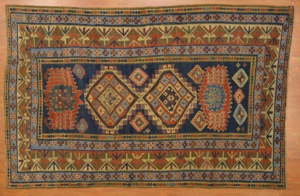 $4,500-5,500 859 Rare antique Kazak rug, approx. 5.8 x 7.9 Caucasus, circa 1900 Est. $6,000-8,000 860 Persian Keshan carpet, approx. 10.6 x 16. 4 Iran, circa 1960 Est.