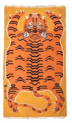 204* Two Tibetan Rugs, each or rectangular form and depicting tiger pelts. Height 59 x width 33 inches.