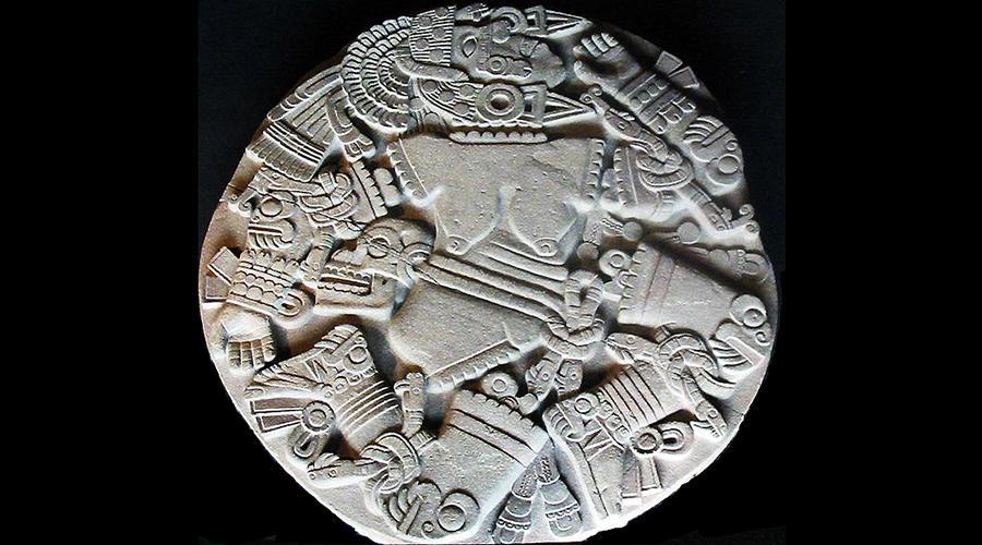 The Coyolxauhqui Stone Form: Circular relief sculpture Volcanic Stone Originally painted red yellow and blue Function: Aztecs often threw people down the steps of temple after