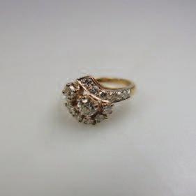237 14k Yellow Gold Ring set with 15 various round cut diamonds (approx. 0.78ct.t.w.), size 6, 3.
