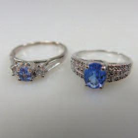 285 2 x 14k White Gold Rings set with tanzanites and a total of 18 small