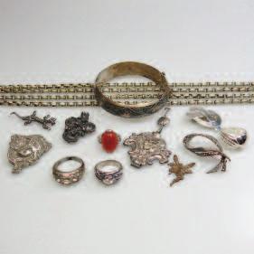 a cigarette case, a Fussell brooch, etc 48 Small Quantity Of
