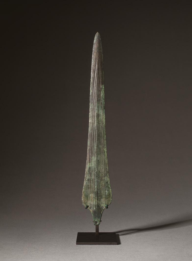 European dagger blade 1300-1200 BC Bronze Length 28cm Elaborate ribbed and grooved decoration stretching the length of the blade with gently