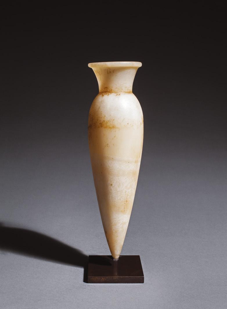 Egyptian conical vase Old Kingdom, 5th-6th Dynasty, c.2500-2200 BC Alabaster Height 23cm The slender, pointed body with gently rounded shoulder, broad flaring collar and flattened lip.