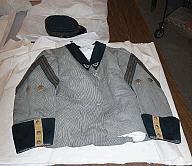 The New York Historical Society Buch Uniform 1957.277a Uniform Jacket Dated: 1865-1870 Cotton, wool, metal, silk Overall: 3 x 18 1/2 x 26 1/4 in. ( 7.6 x 47 x 66.