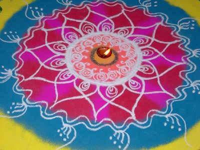 Rangoli Rangoli with Diya, Activity Village. History: Rangoli is a Sanskrit word meaning a creative expression of art through colors. It is not only art but also a symbol of good luck.