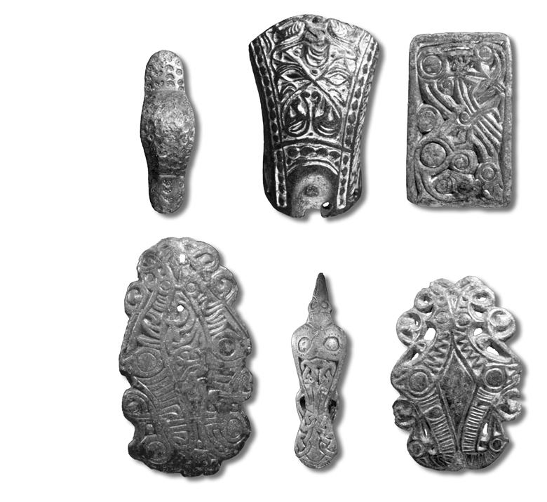 Fig. 9. A collection of Vendel Period brooches. 1:1. Photo B. Almgren, LUHM. with some other type of brooch. The type is clearly south Scandinavian with a distribution from Jutland to Bornholm.