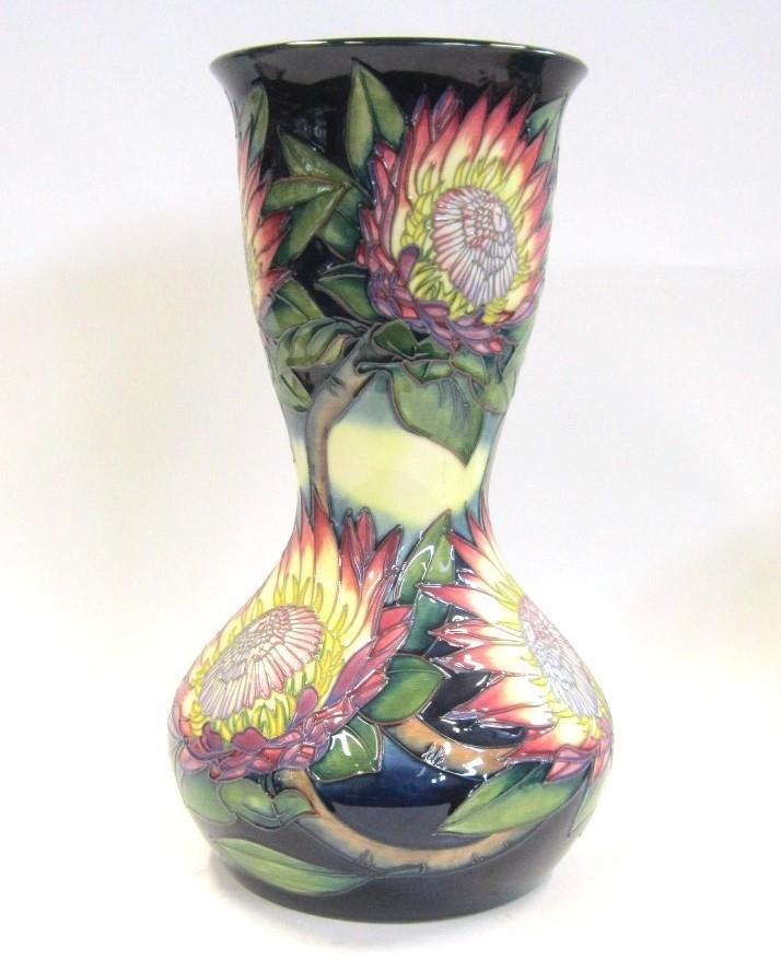 A large Limited Edition Moorcroft Vase by Emma Bossons Decorated with vibrant flowers on a blue and yellow ground, impressed marks, artists signature, dated and