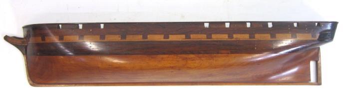 An early 19th Century Norwegian carved wood Mangle Board with horse handle, the length carved with panels of scrolling