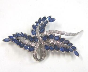 An Edwardian diamond and seed pearl Brooch of foliate openwork design (1 pearl missing), associated case. 3 cms wide 150-250 Lot 56 Lot 57 57.