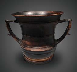 C. CHF 9,800 A LARGE ARYBALLOS. H. 10.9 cm. Faience. A round-bodied vessel with wide rim and strap handle.