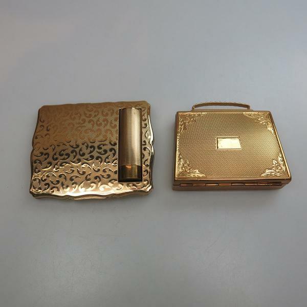 9 cms $150 200 2 Two Gold Tone Metal Compacts the first by